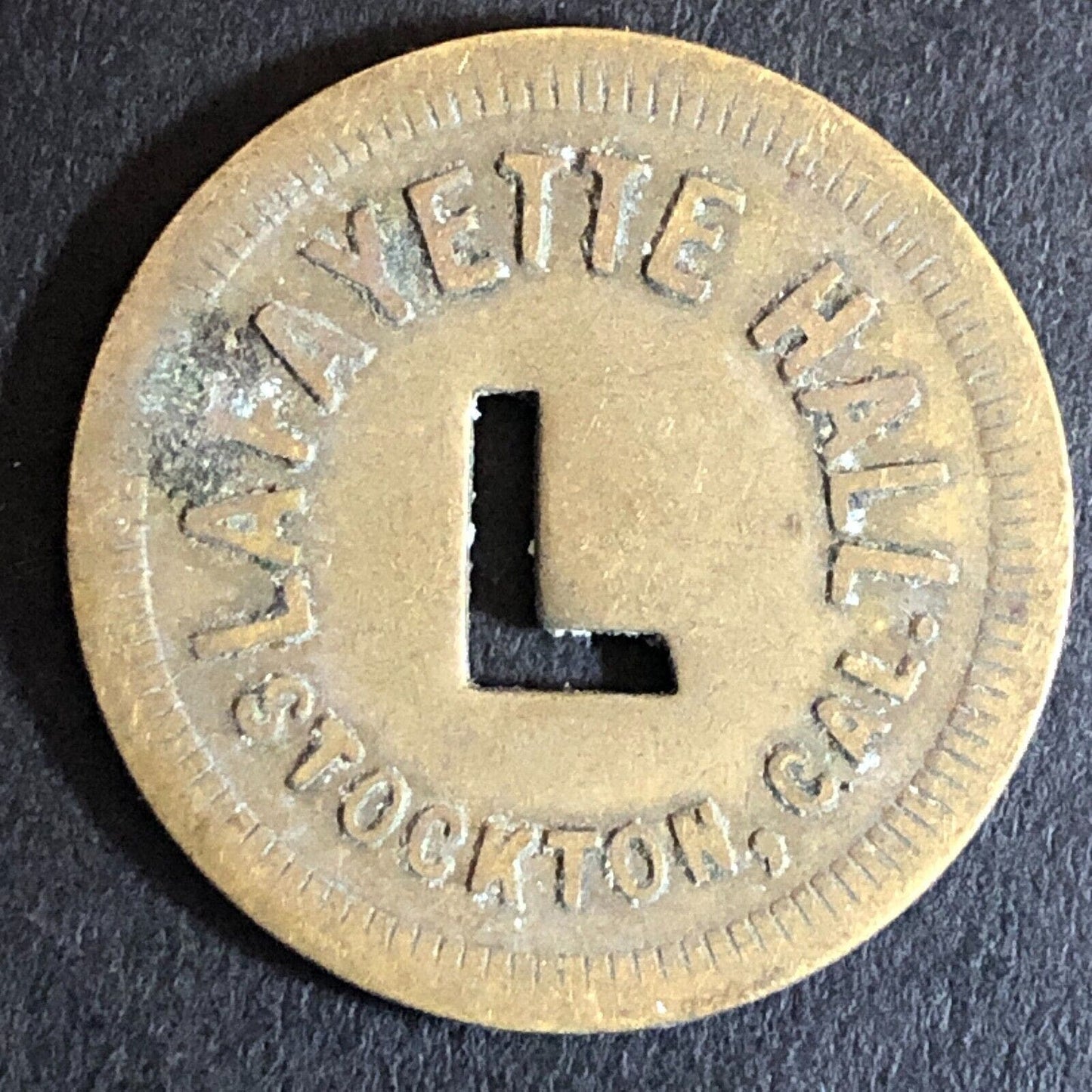 Lafayette Hall Stockton, CA Brass Trade Token w/ "L" Cutout 24mm - Scarce