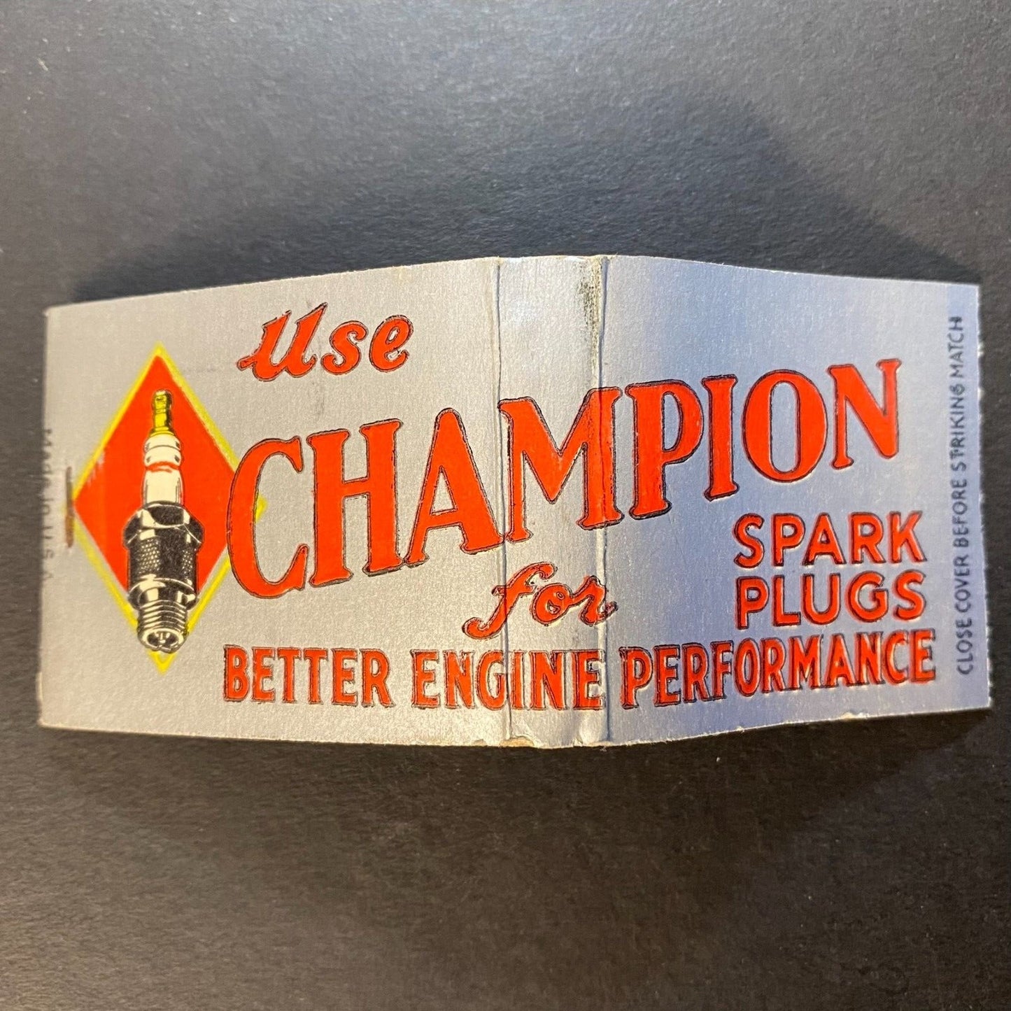 Champion Spark Plugs Near Full (-4) Matchbook c1930's Silver Ink Scarce