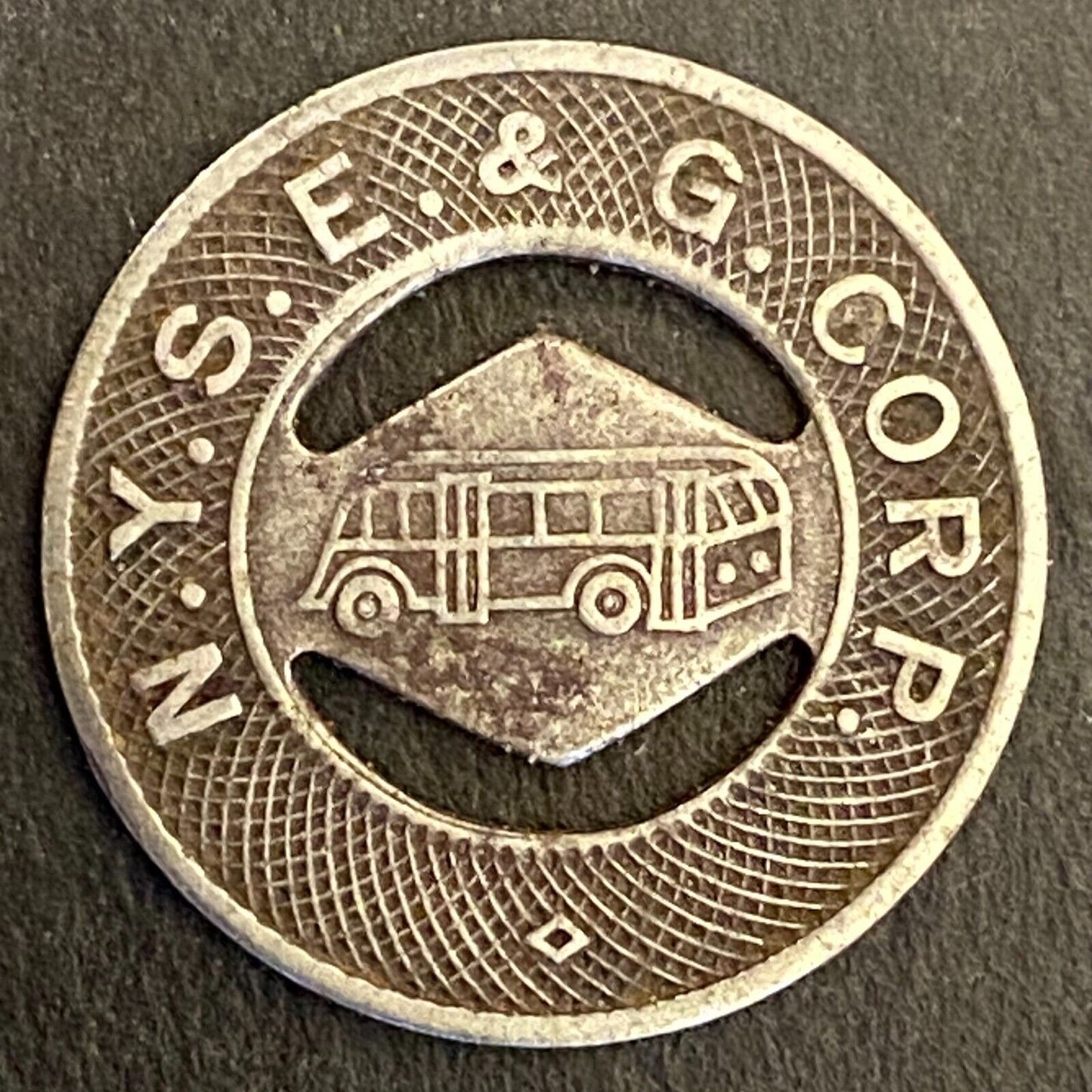 N.Y.S.E. & G. Corp G/F One Fare Elmira Steel Transit Token c1944 21mm (#1)