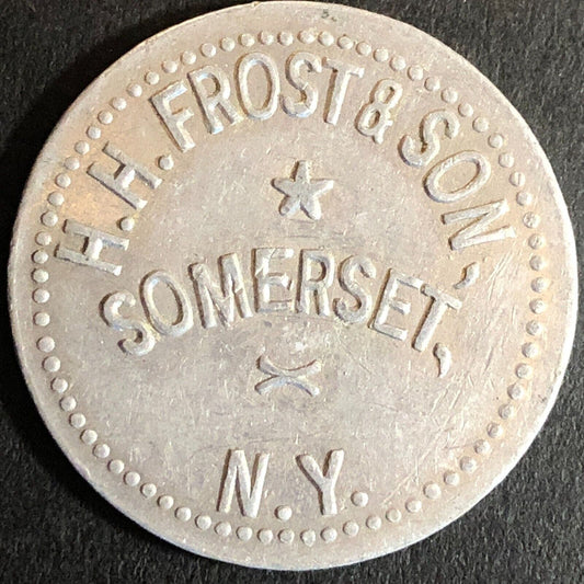 H.H. Frost & Son Somerset, NY G/F 50c Alum Trade Token c1920's-30's - 30mm