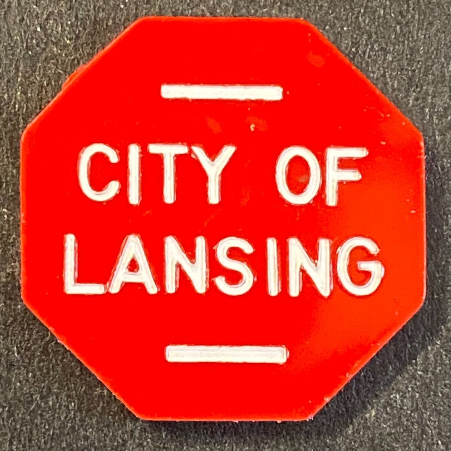 "City of Lansing" Red Plastic c1970's Transit ?* Token 23mm