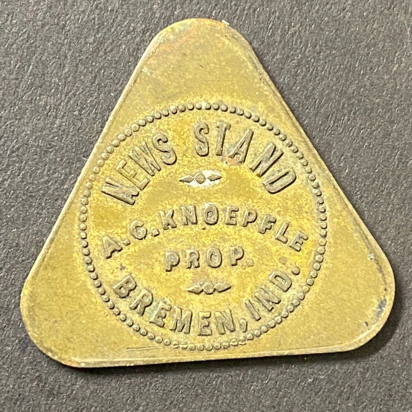 Bremen, IN A.C. Knoepfle News Stand Brass G/F 25c Trade Token 29x31mm Scarce