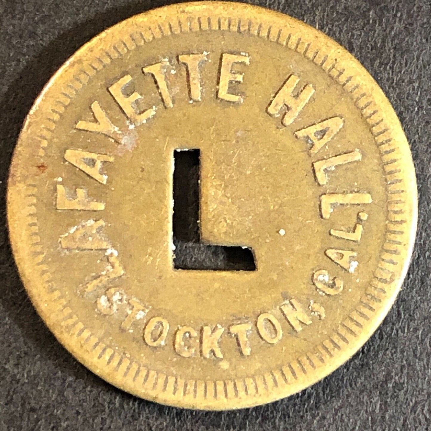 Lafayette Hall Stockton, CA Brass Trade Token w/ "L" Cutout 24mm Scarce