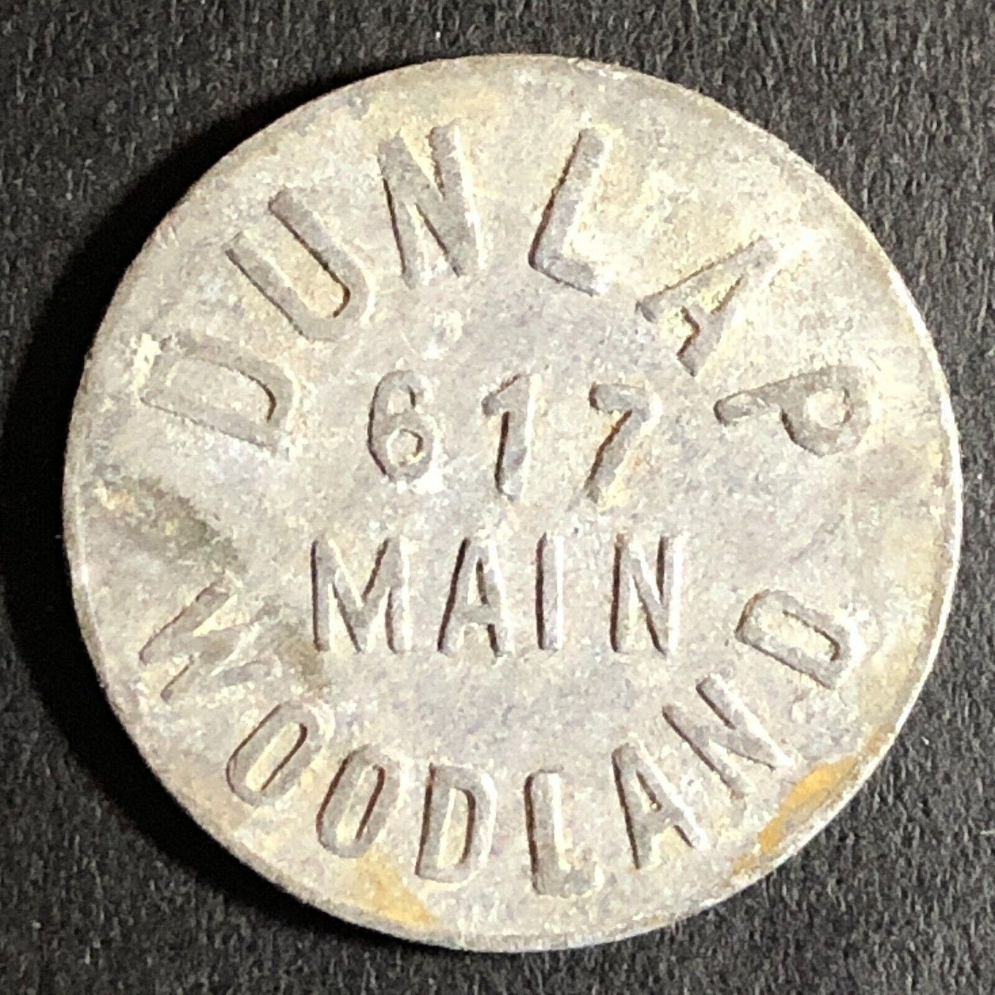 Dunlap (Cigars) 617 Main St. Woodland CA c1920's G/F 10c Alum Trade Token 21mm