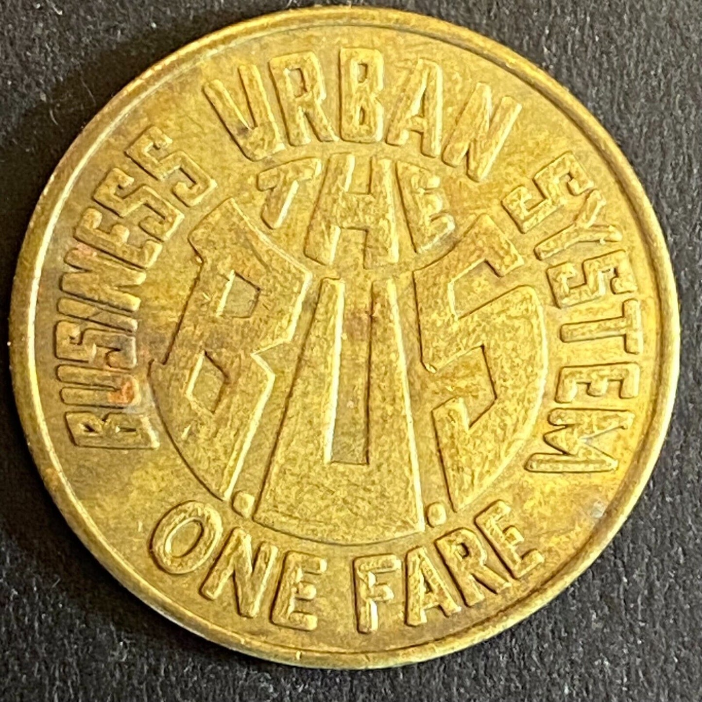 Business Urban System (Gallup, NM) One Fare Bus Token 23mm c1976 Scarce (#3)