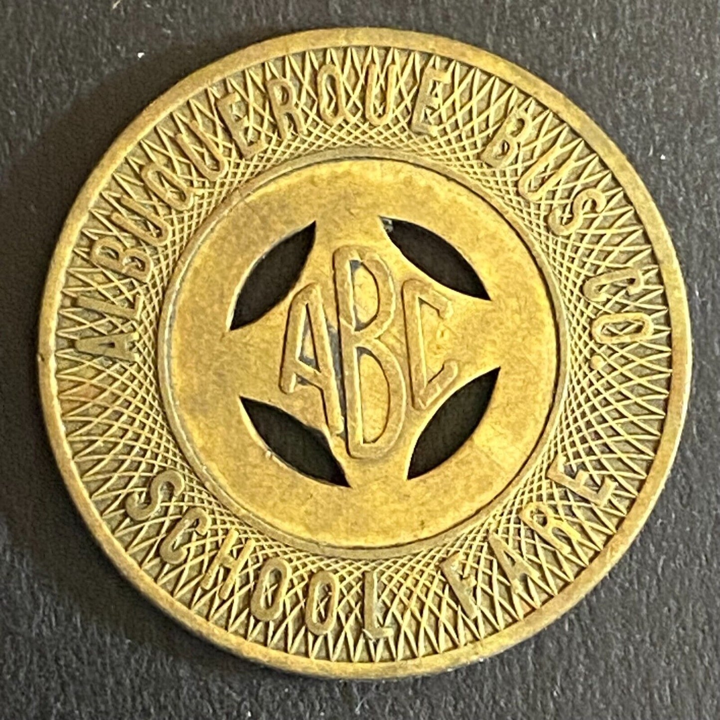 Albuquerque Bus Co. "Good on School Days Only" Transit Token - 23mm (1)
