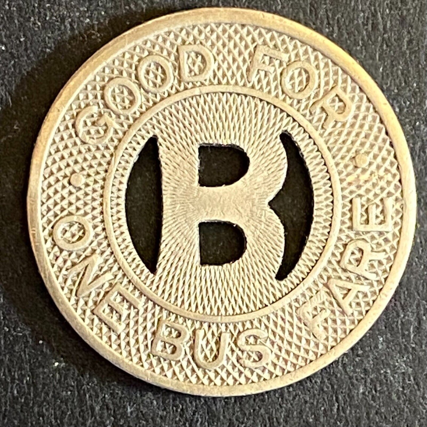 Capitol Bus Line (Bismarck, ND) WM G/F One Bus Fare Transit Token -- 20mm