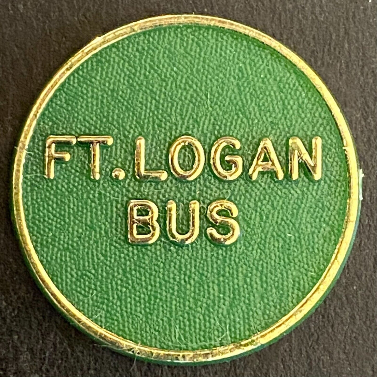 Ft. Logan Bus Englewood, CO Plastic Transit Token 23mm (#4)