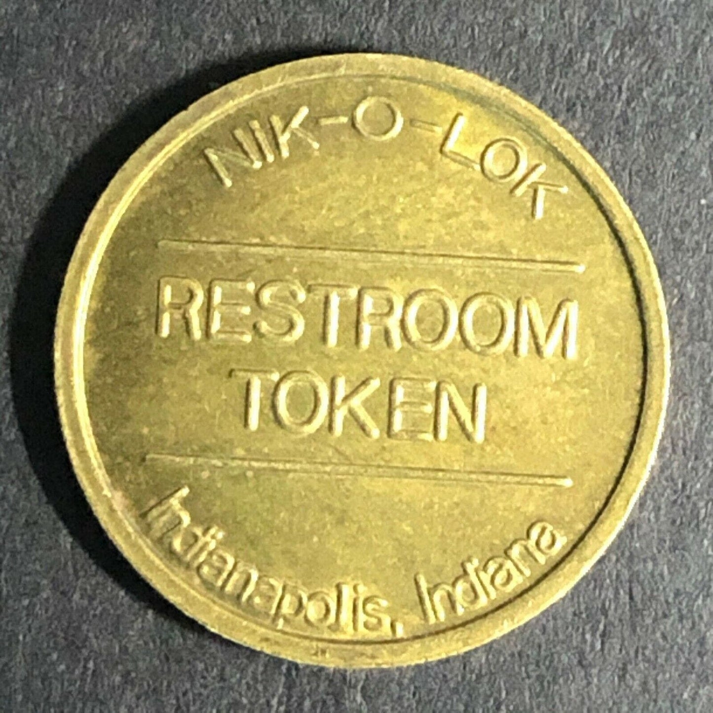 16.51mm Nik-O-Lok Indianapolis, IN Brass Restroom Token - Fauver Collection