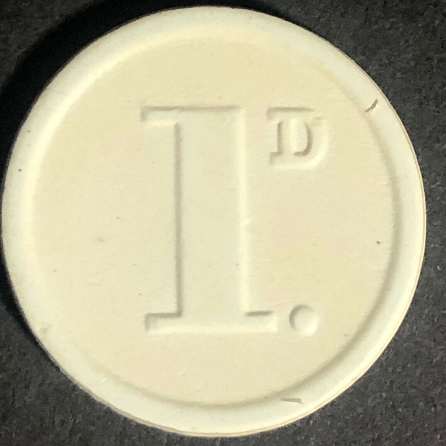 St. Helens Transport England Plastic Token White 1D 22mm c50's-60's