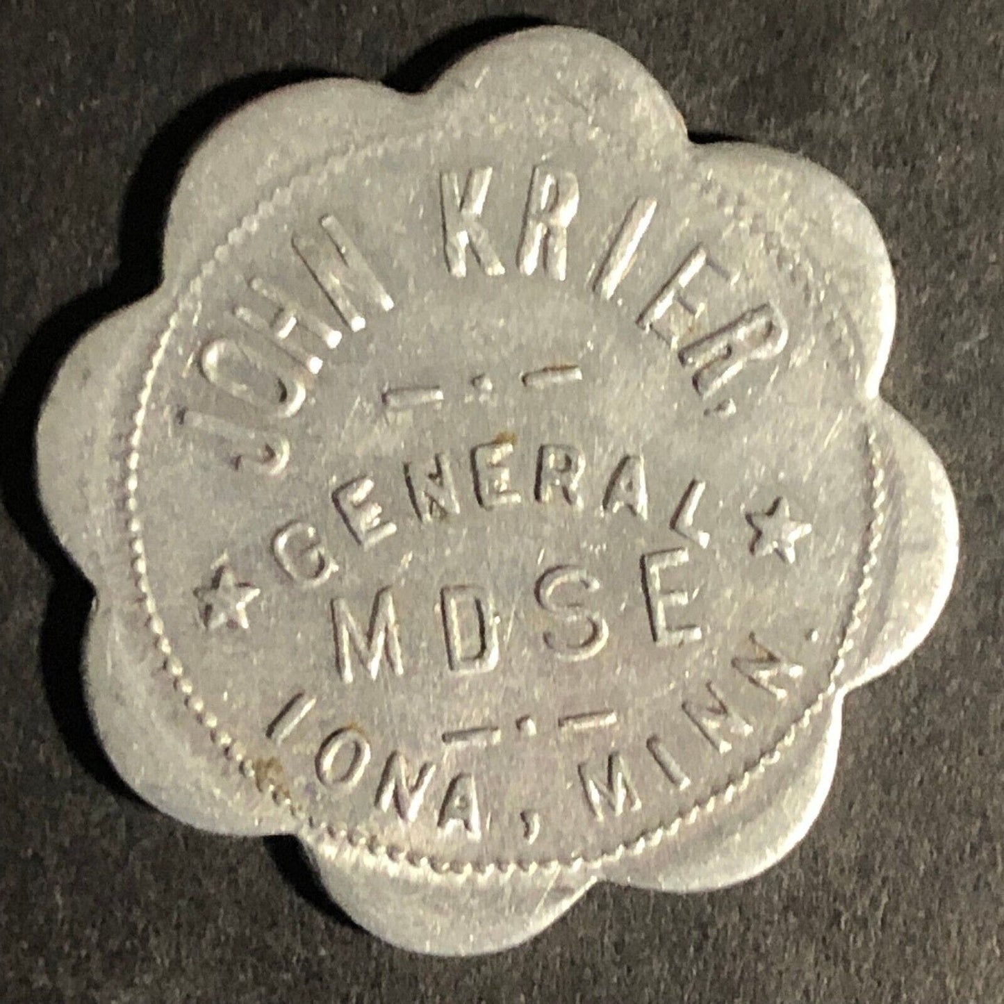 John Krier General Mdse. Iona, Minn G/F 50c Alum Scalloped Token 29mm Scarce