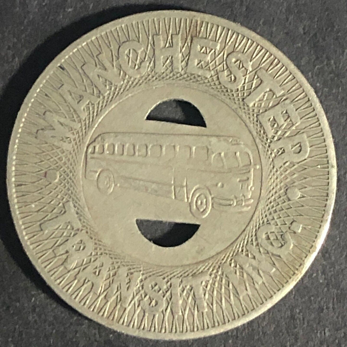 Manchester Transit Inc (NH) G/F One School Fare WM Bus Transit Token 22mm Scarce