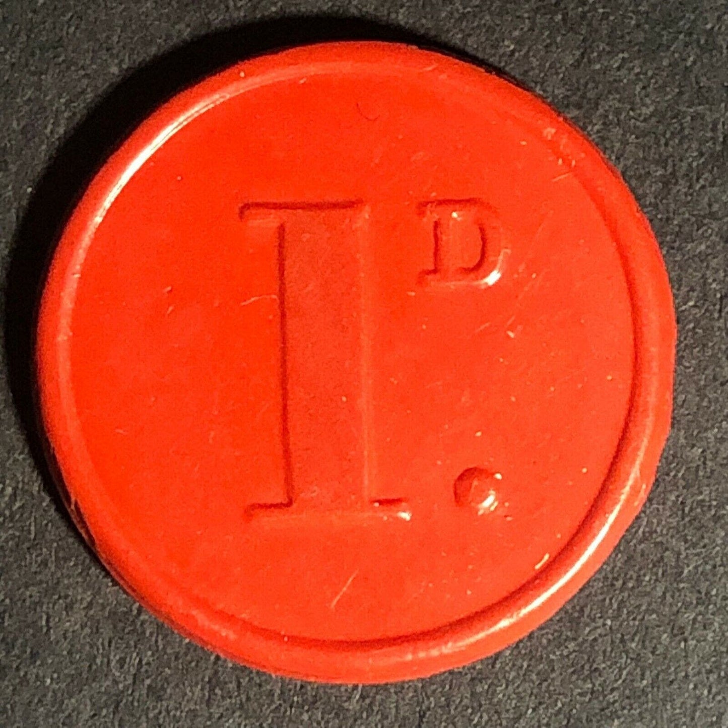 Sheffield Transport England Plastic Token Red 1D 22mm c50's-60's