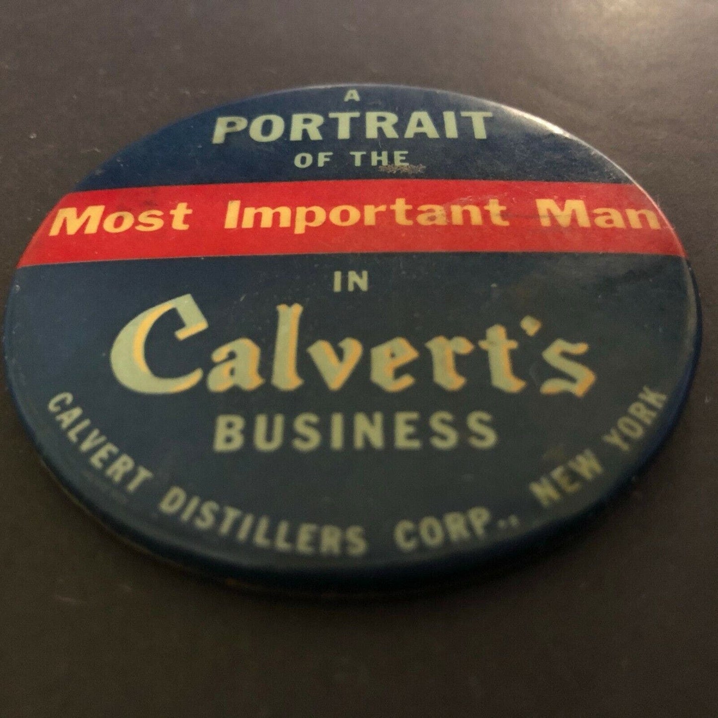 Calvert Distillers Advertising Mirror / Paperweight 2 1/2" "Most Important Man"