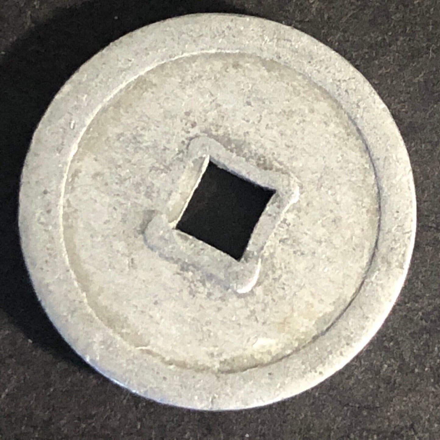 N.M.V. Milk Token Alum. 20mm Scarce (Nelson Milk Vendors New Zealand?)
