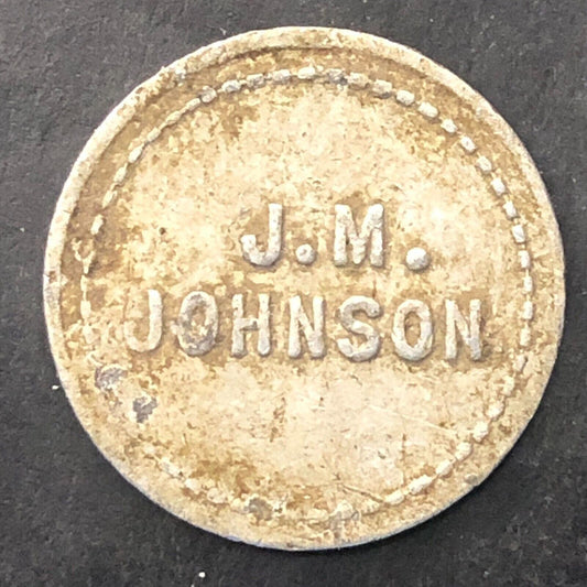 J.M. Johnson G/F 5c Merchandise Trade Token Alum. 20mm Unknown