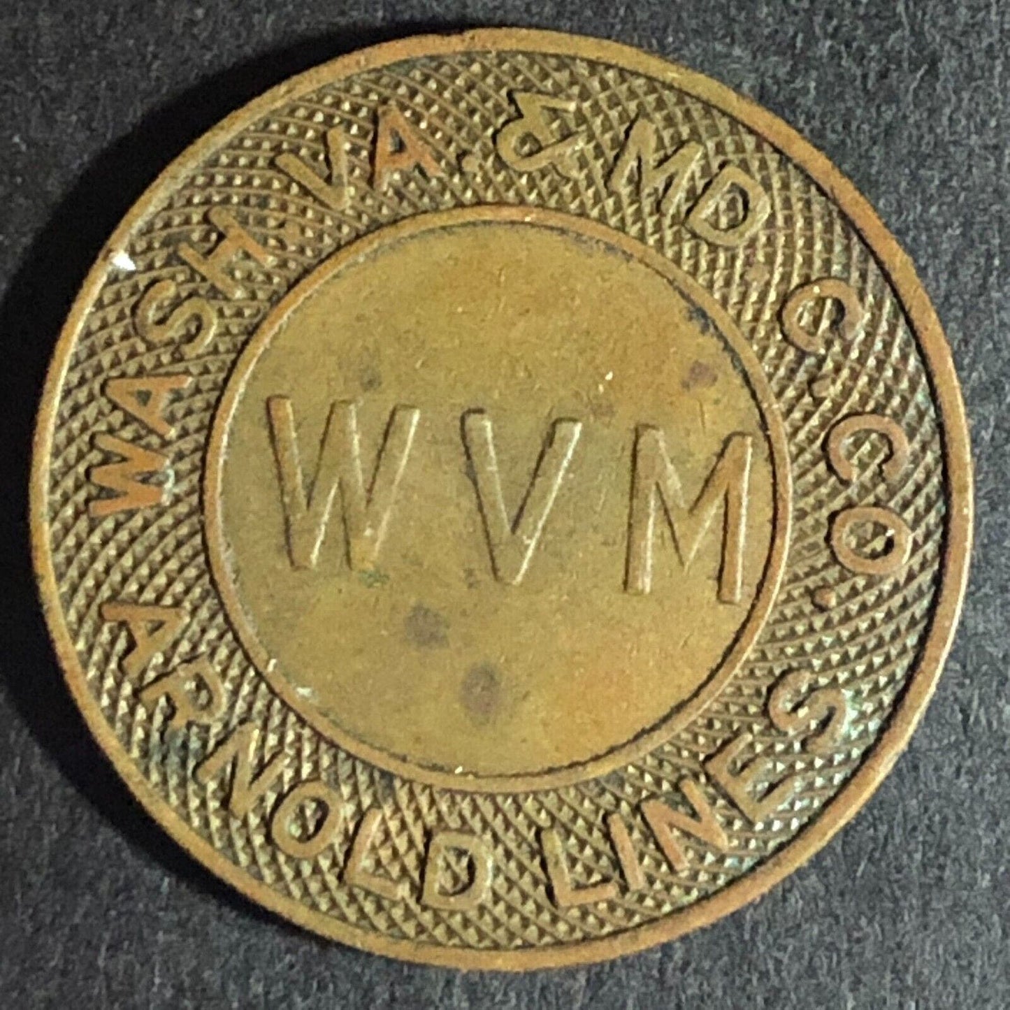 Arnold Lines Wash, VA. & Md. C. Co. "WVM" Brass G/F One Fare Transit Token 23mm