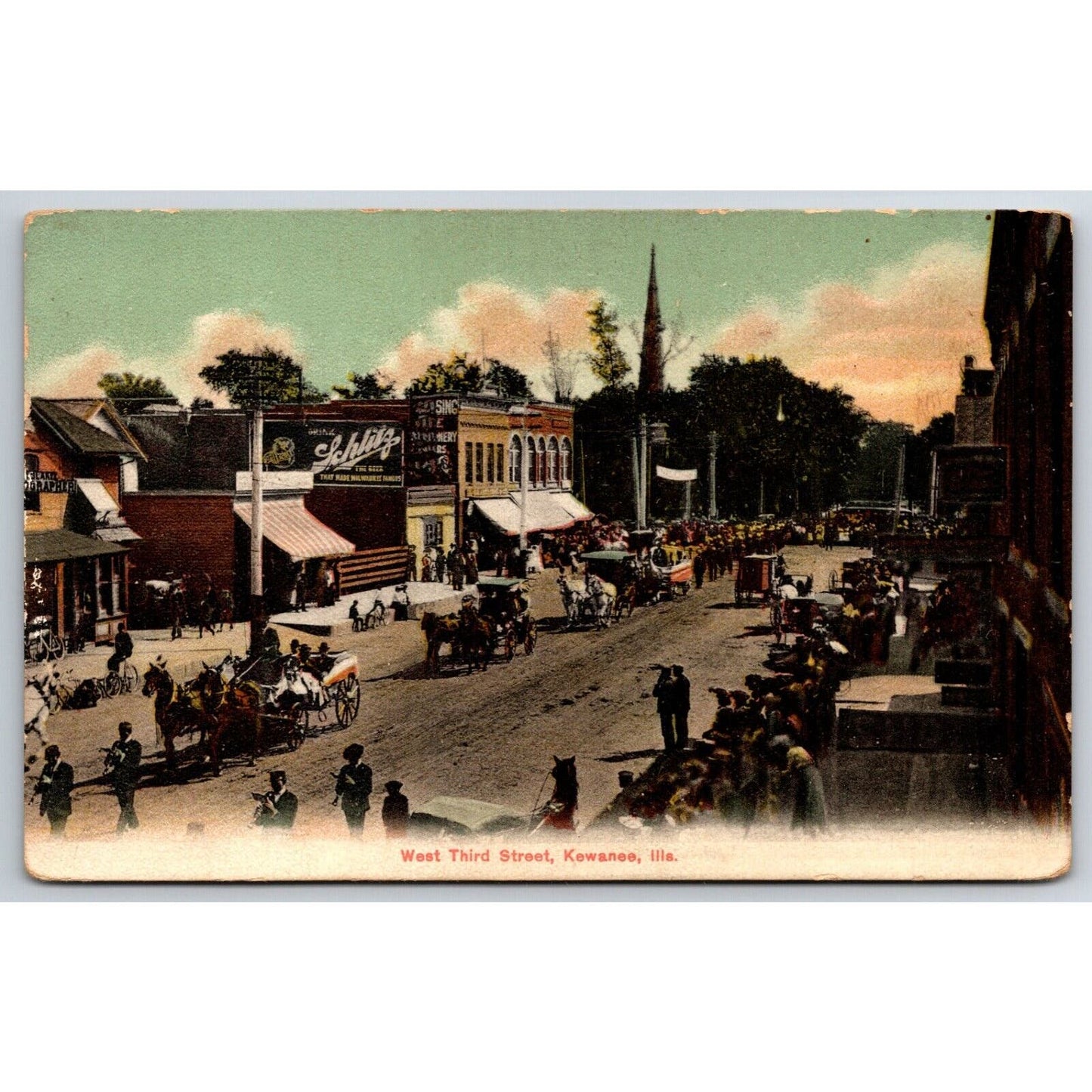 Parade West Third Street Kewanee, IL Schlitz Sign Horse Wagon Postcard c1907
