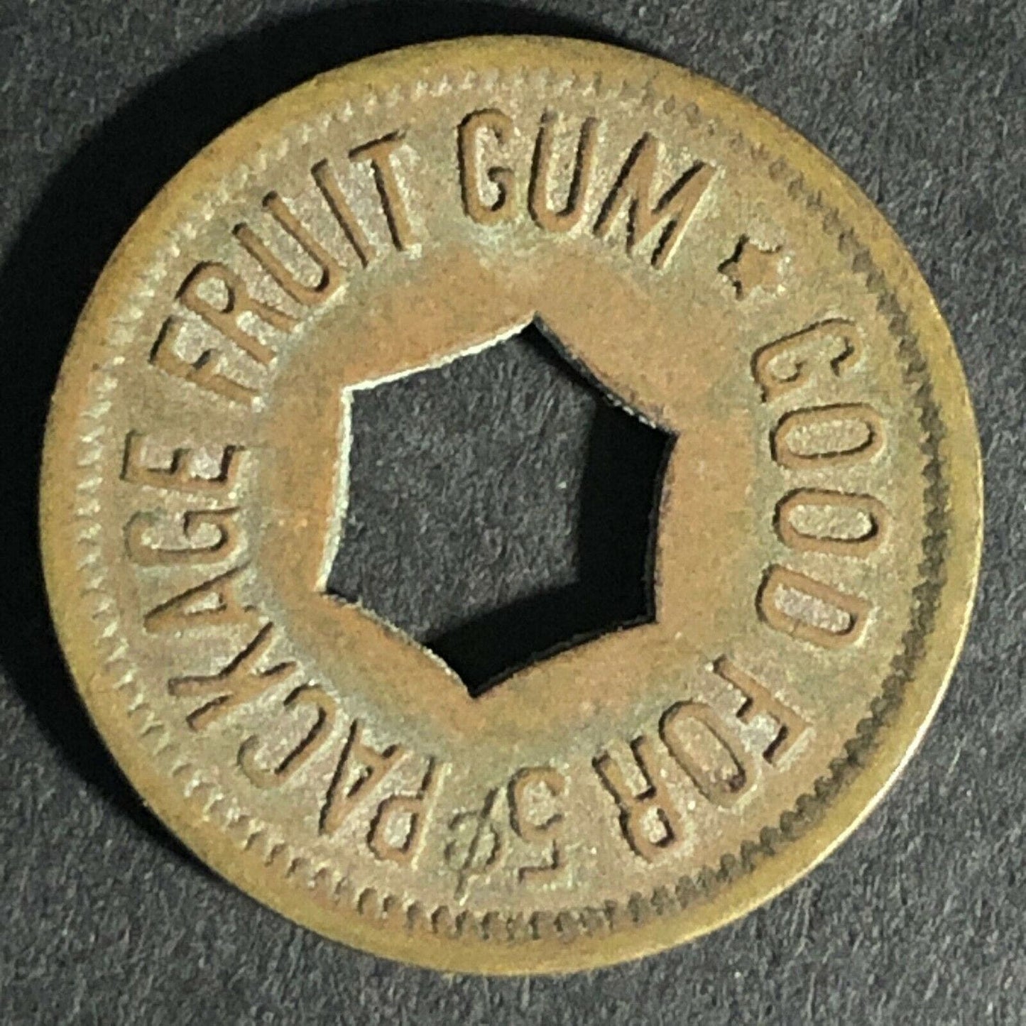 "Good For 5c Package Fruit Gum" Token (Watling Mfg. Chicago) Hexagon Cut 21.3mm