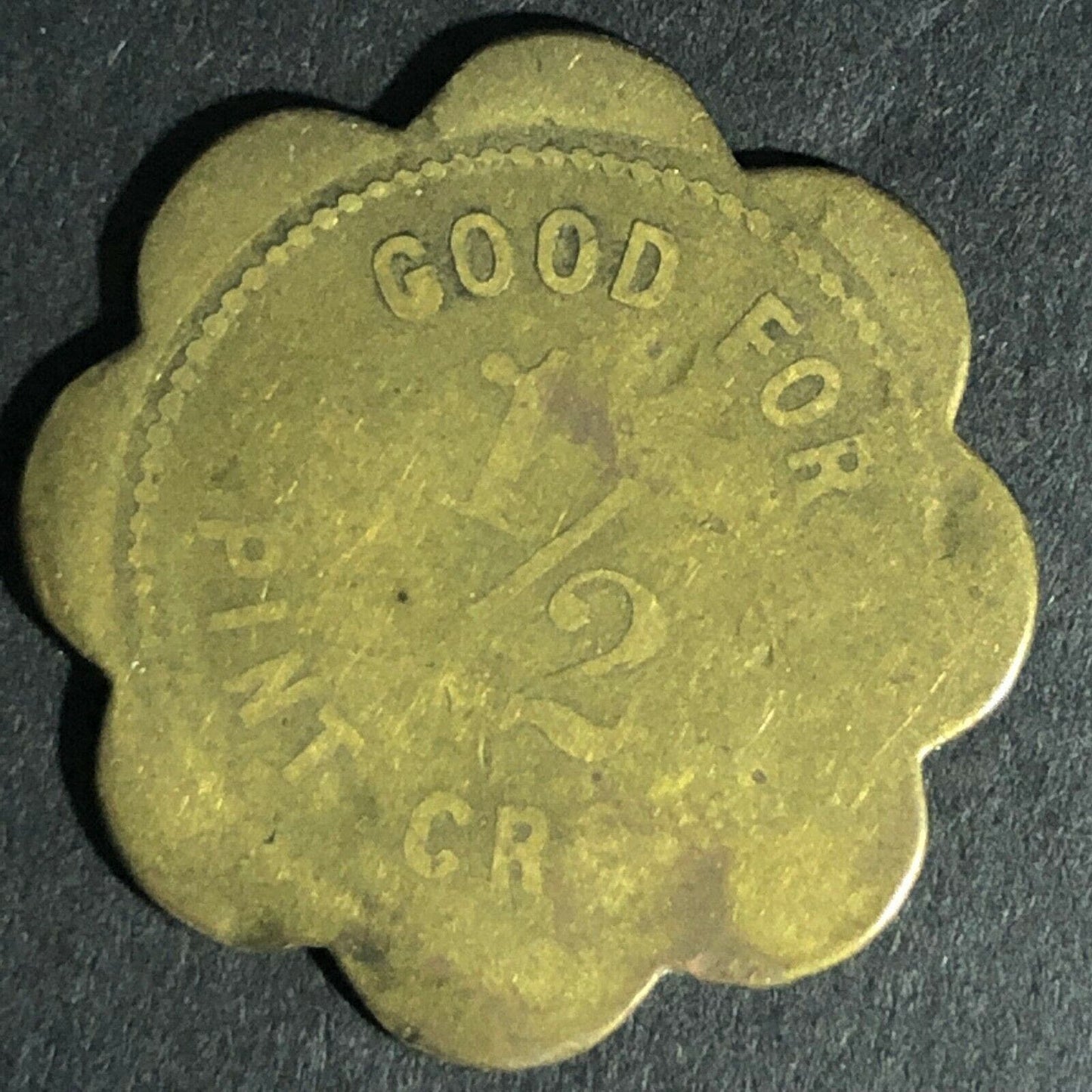 Iowa Dairy Co. Token Good For 1/2 Pint Cream 27mm Brass Scalloped