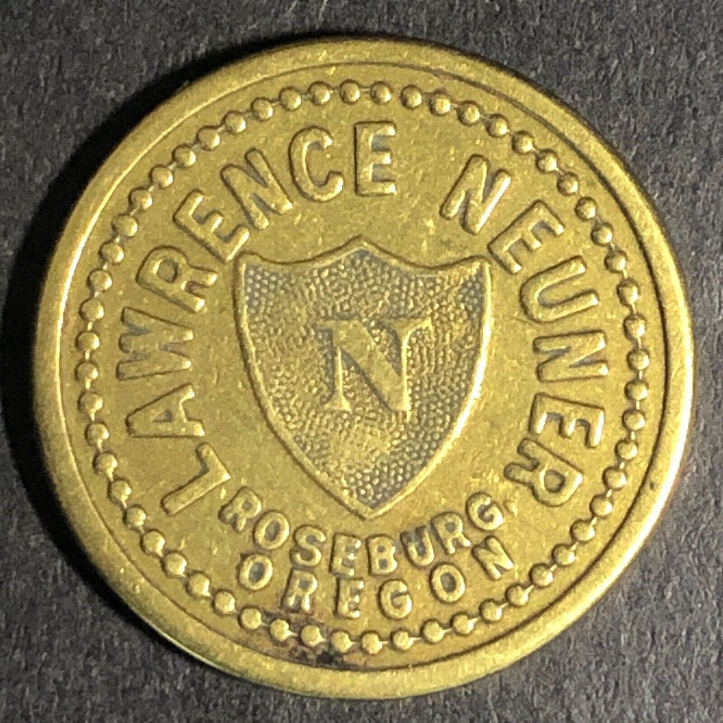 Lawrence Neuner Roseburg, ORE Cigar Store Brass G/F 5c Trade Token 21.1mm c1925