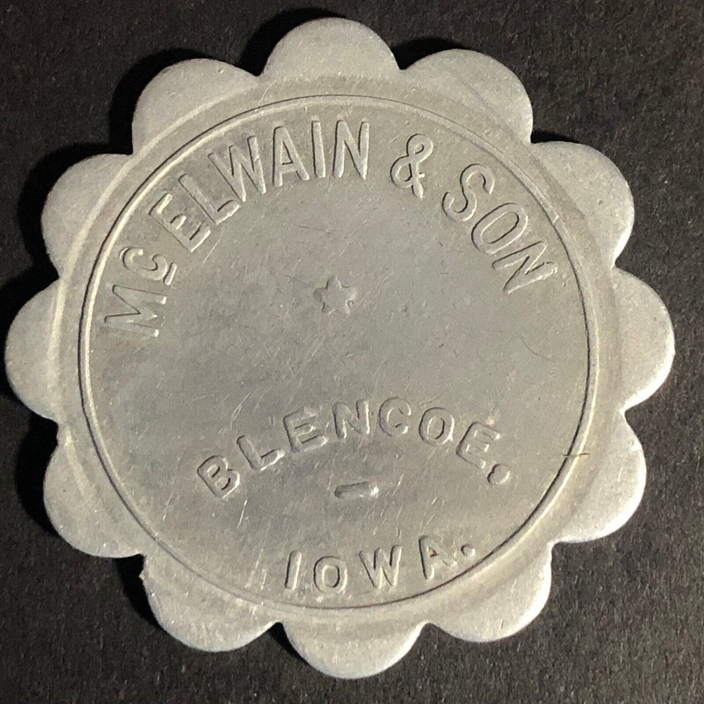 McElwain & Son Blencoe Iowa G/F $1 In Trade Scalloped Alum. Token 37.7mm Scarce