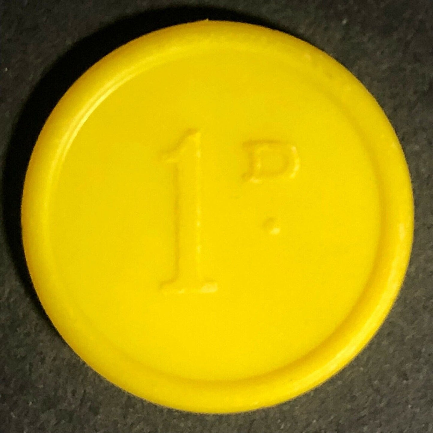 Oldham Transport England Plastic Token - Yellow 1D 22mm c50's-60's