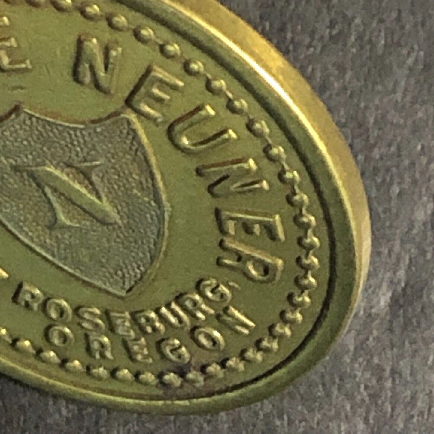 Lawrence Neuner Roseburg, ORE Cigar Store Brass G/F 5c Trade Token 21.2mm c1925