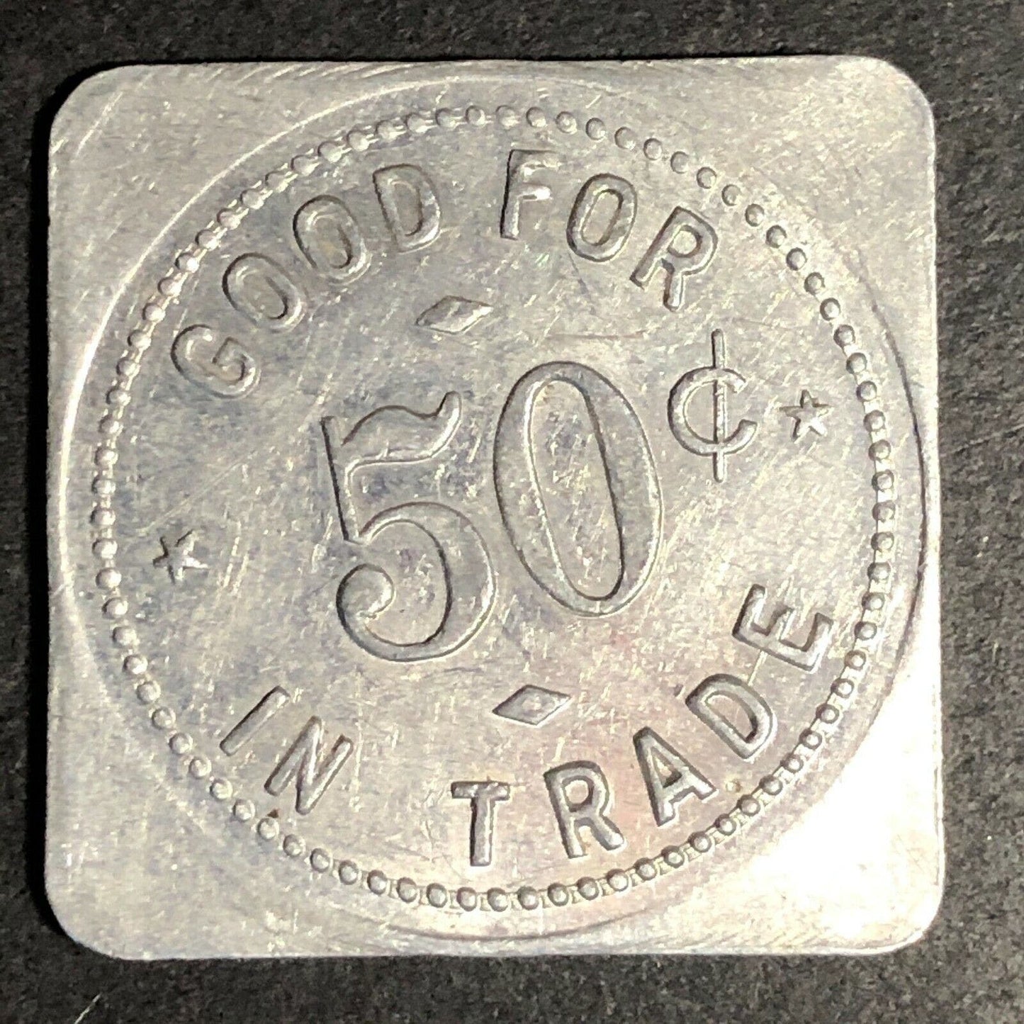 Hinze Grocery 28mm Aluminum Token "Good For 50c In Trade" Gresham, Nebraska