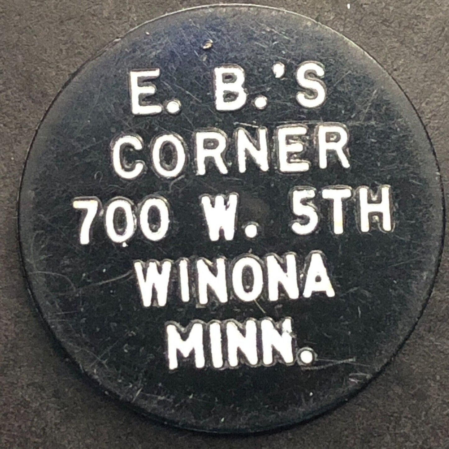 Winona, WI "E.B.'s" Plastic G/F 20¢ In Trade Token 22.65mm - c1960's-70's