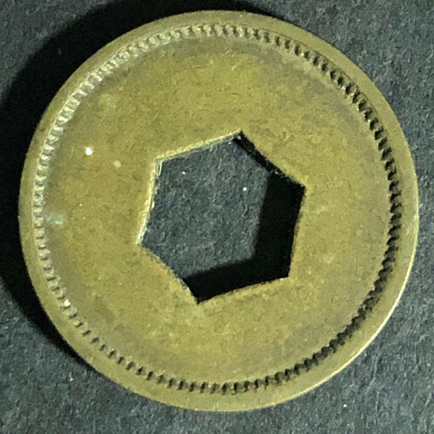 "Good For 5c Package Fruit Gum" Token (Watling Mfg Chicago) Hexagon Cut 21.26mm