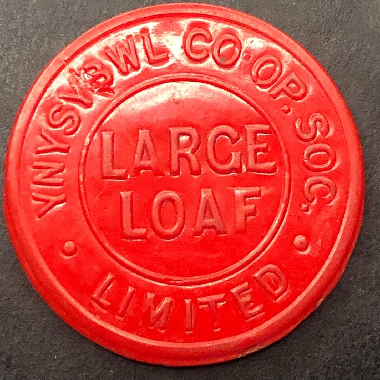 Ynysybwl Co. CO-OP Soc. (Wales) Red Plastic "Large Loaf" Token 30mm c1970's