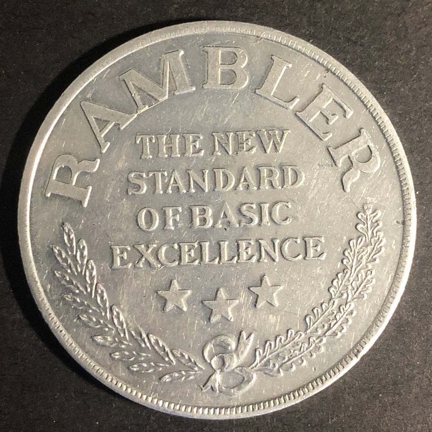 "Your Rambler Dollar is a Bigger Dollar" Alum. Token 45mm c1960 Scarce VGC