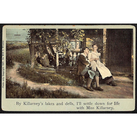 Irish Postcard "By Killarney's Lakes and Dells" Couple Sit Outside c1907