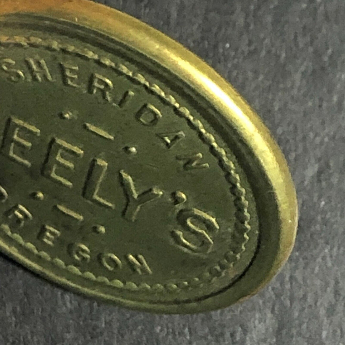 Neely's Sheridan Oregon Brass G/F 5c Trade Token -- 22mm