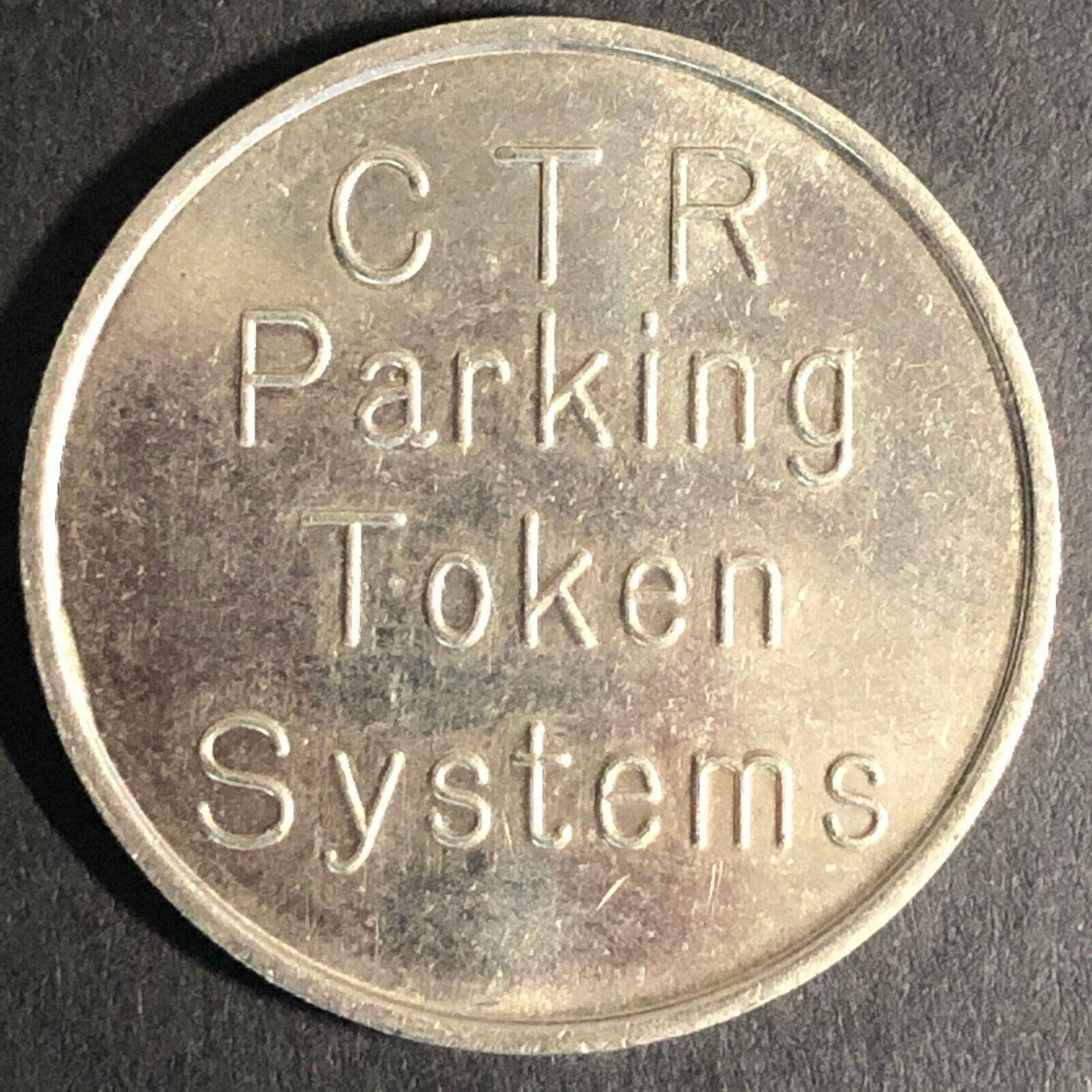 25.3mm CTR Nickel Plated? Parking System Token - Fauver Coll.