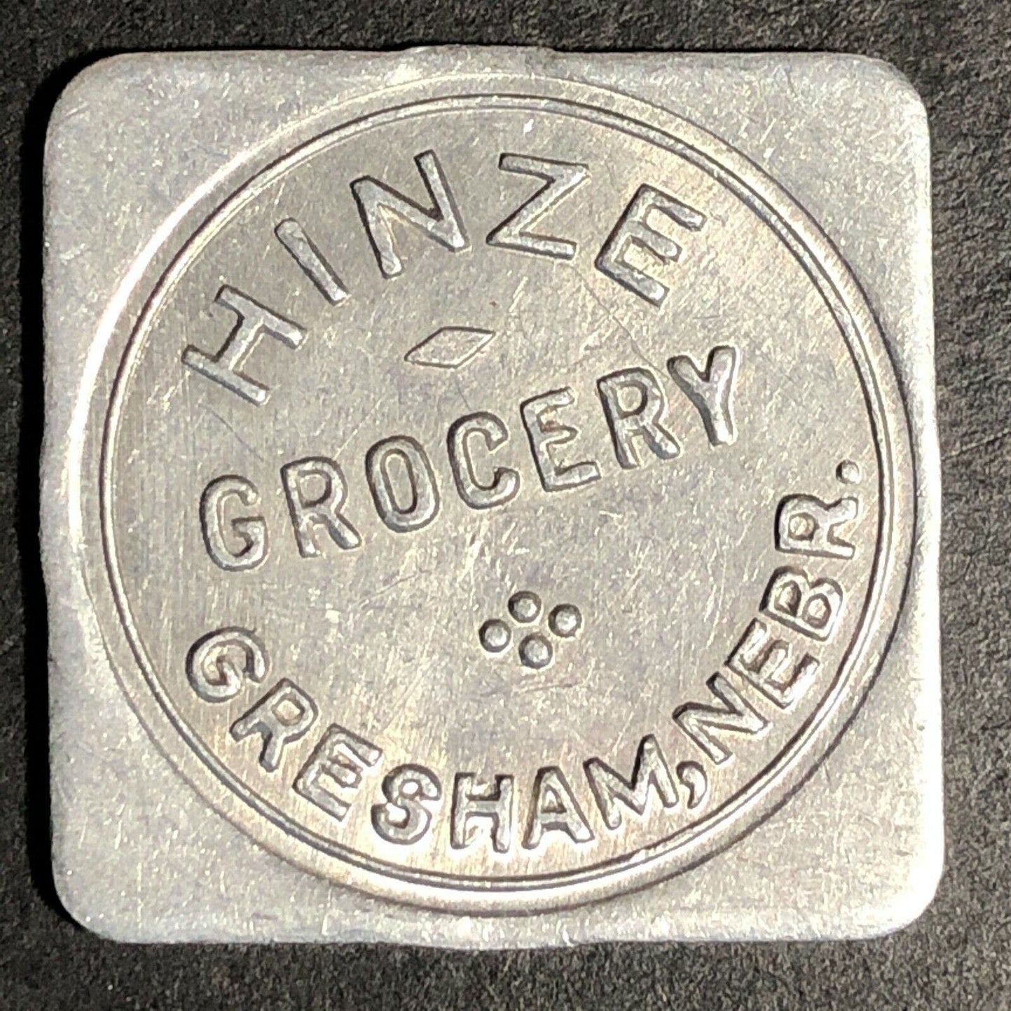 Hinze Grocery 26mm Aluminum Token "Good For 25c In Trade" Gresham, Nebraska