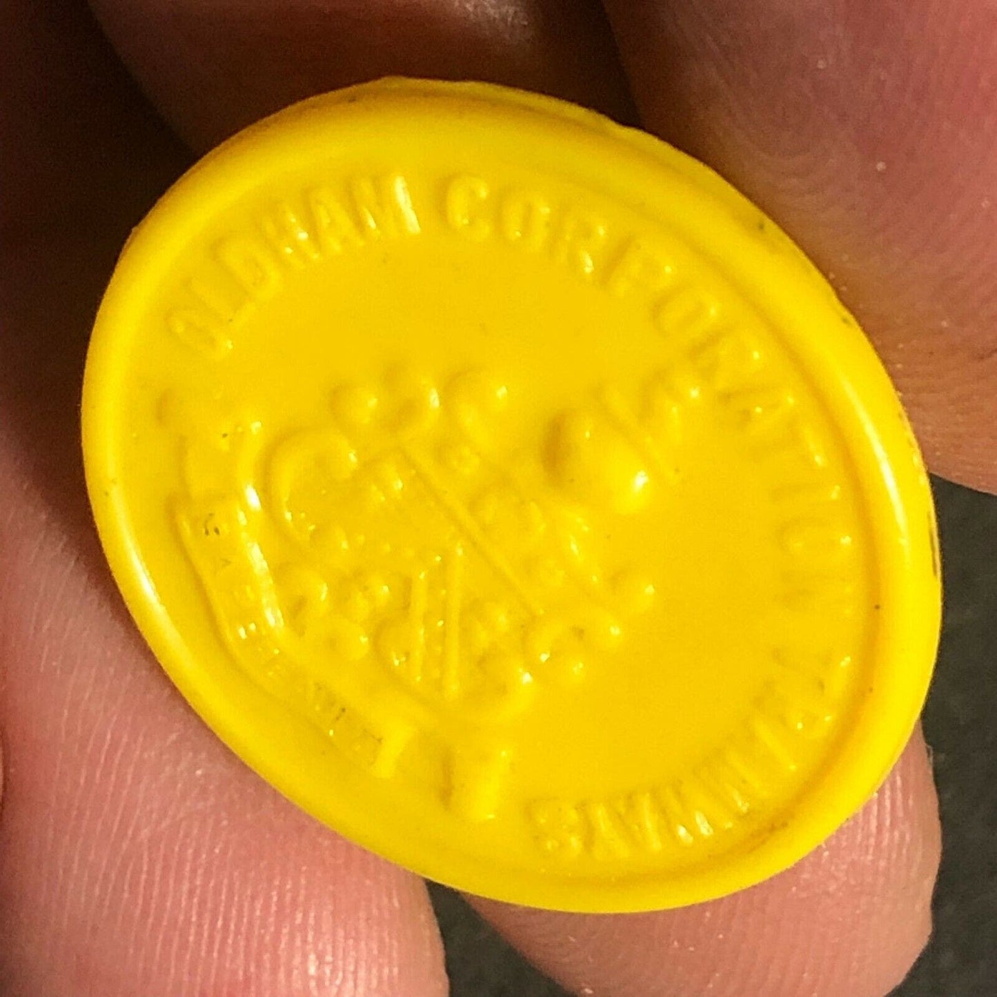 Oldham Transport England Plastic Token Yellow 1D 22mm c50's-60's