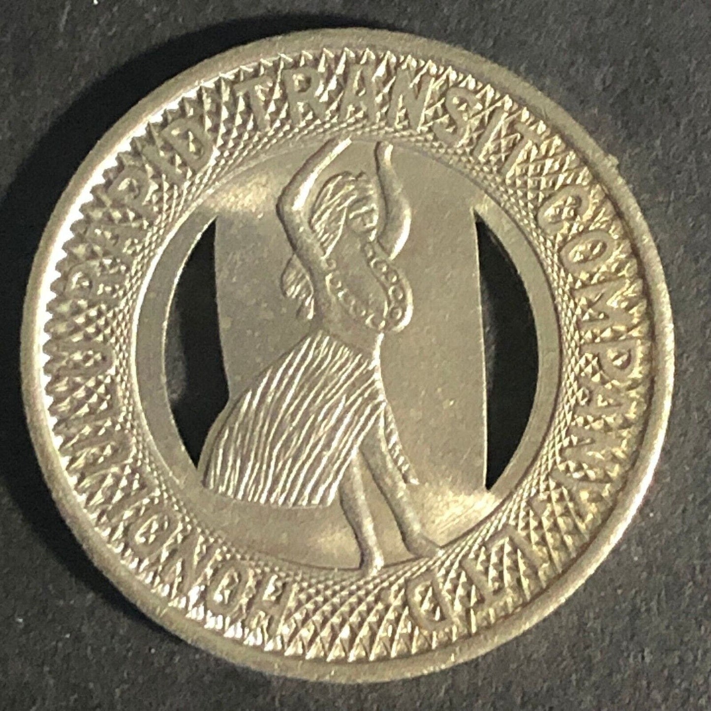 Honolulu Rapid Transit Co. 1951 White Metal Transit Token 22.78mm w/ Hula Girl