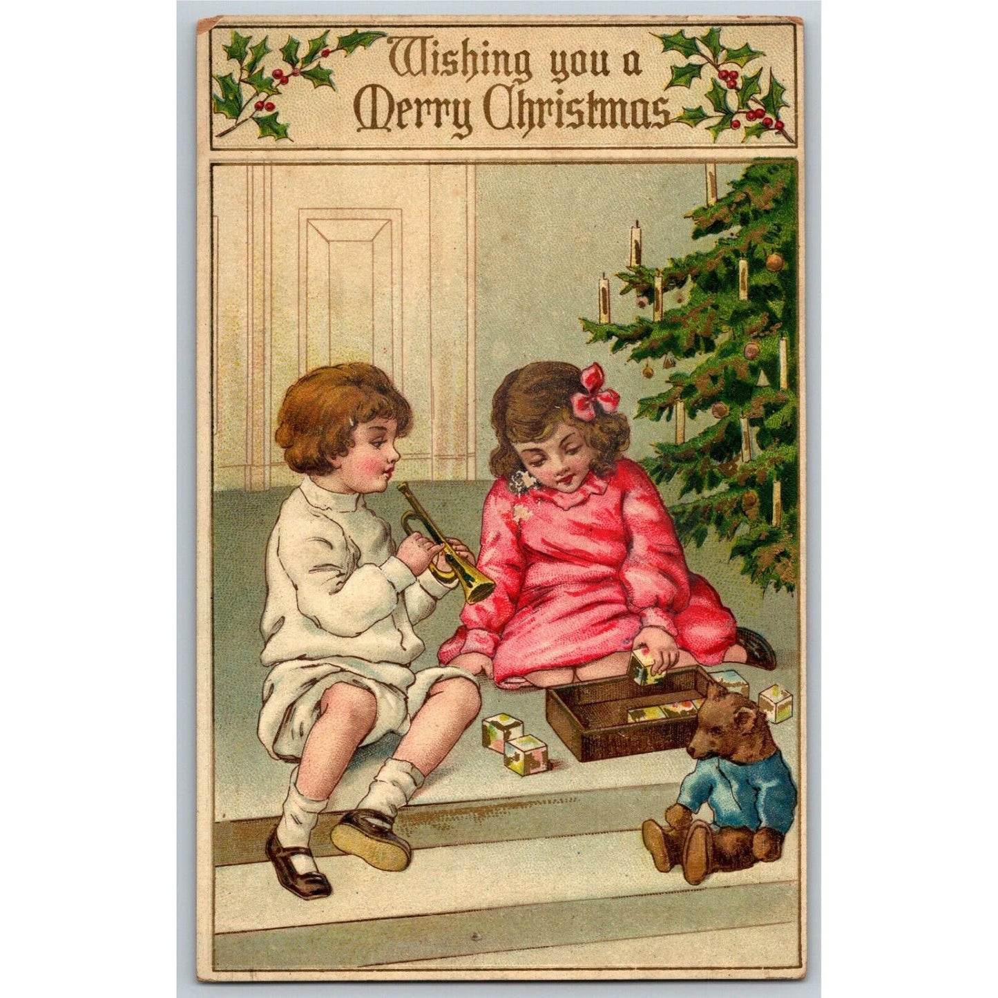 Vintage Postcard c1915 Boy & Girl Opening Presents Under Christmas Tree - Emboss