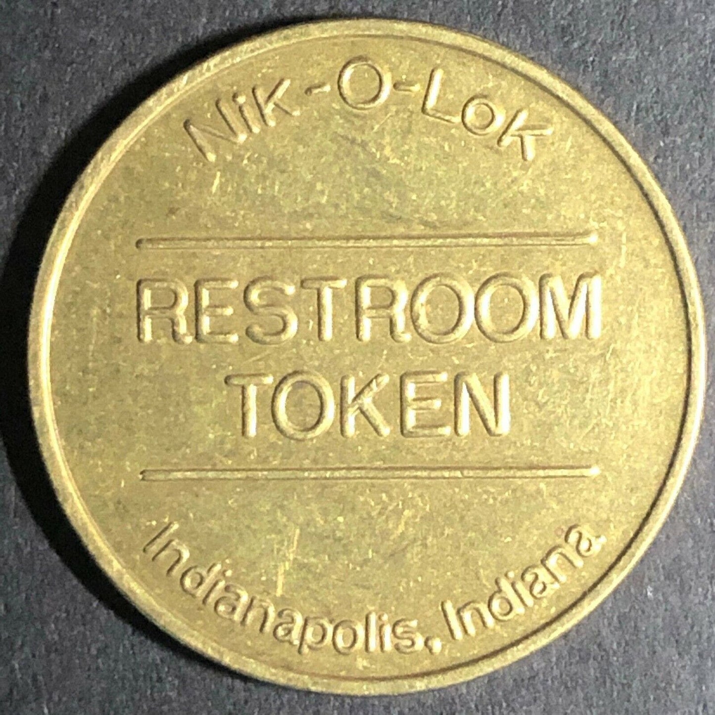 32mm Brass "Nik-O-Lok" Restroom Token Indianapolis, IN - Fauver Coll.