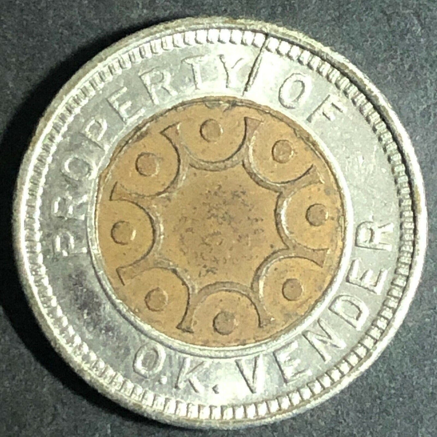 Vintage 21mm Alum. / Brass Bimetallic / Encased O.K. Vender Token
