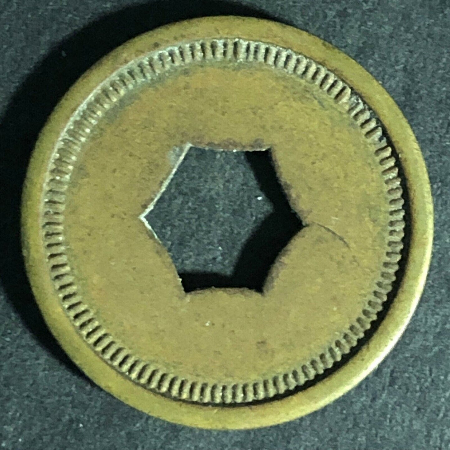 "Good For 5c Package Fruit Gum" Token (Watling Mfg Chicago) Hexagon Cut 21.27mm