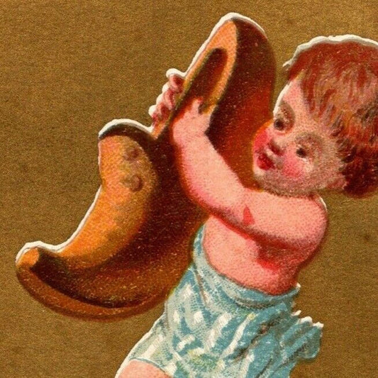 Gilt "Decembre" Child w/ Wooden Shoe (Soapine) Unmarked Victorian Trade Card