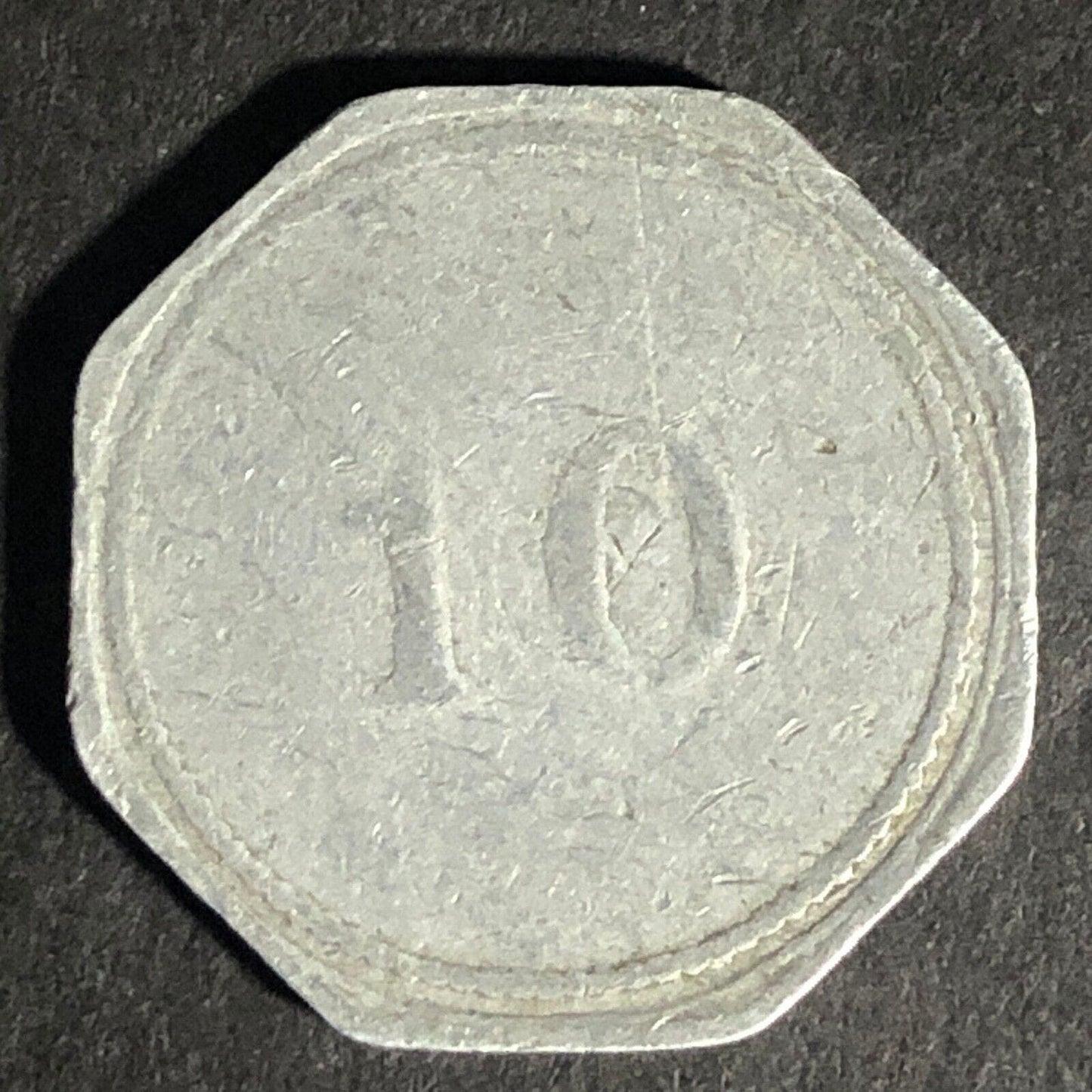 Fifth Avenue Book Store J.W. Curtis "10" Octagon Alum. Token 22.7mm Scarce
