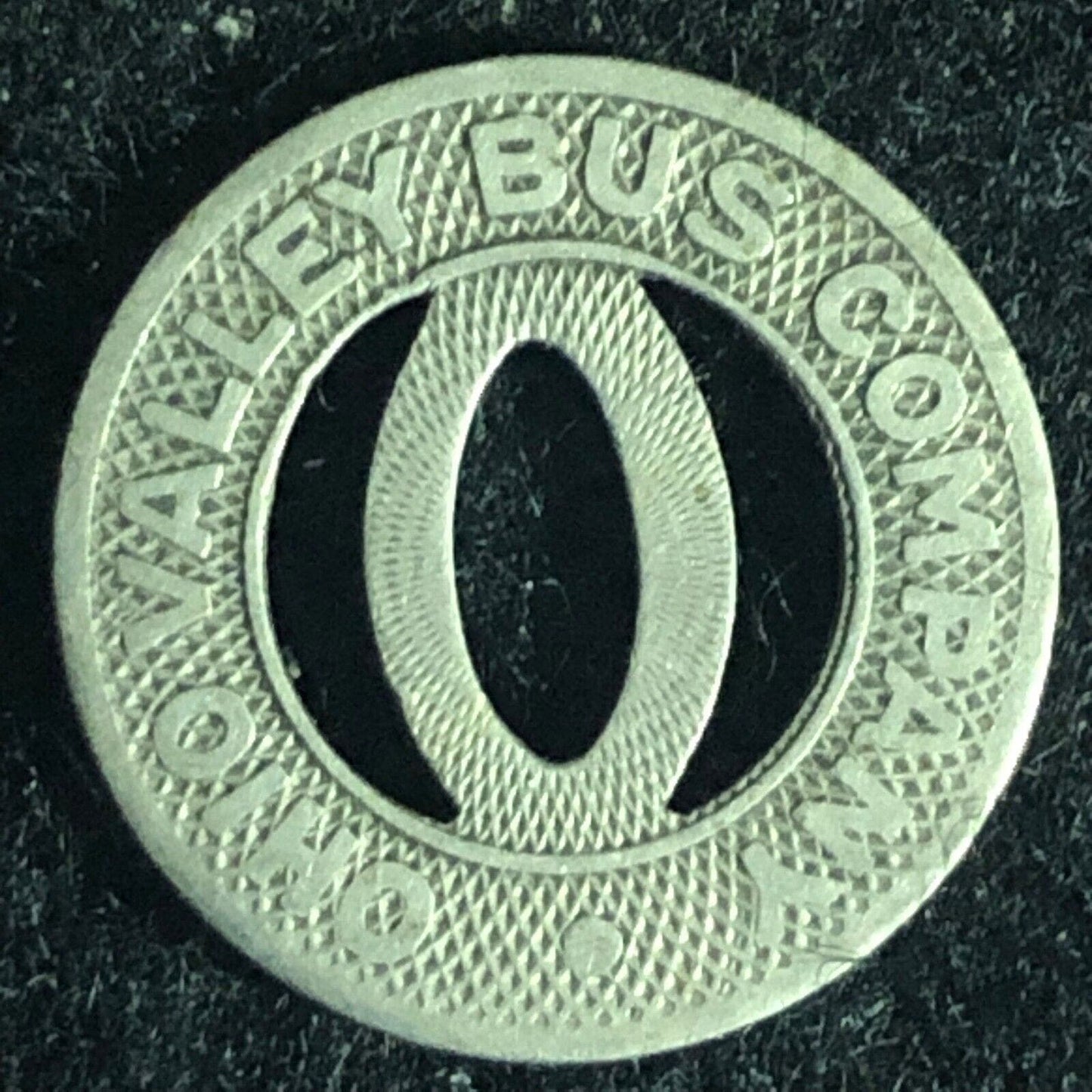 Huntington, WV Ohio Valley Bus Company G/F One City Fare Token 16mm Hanging "O"