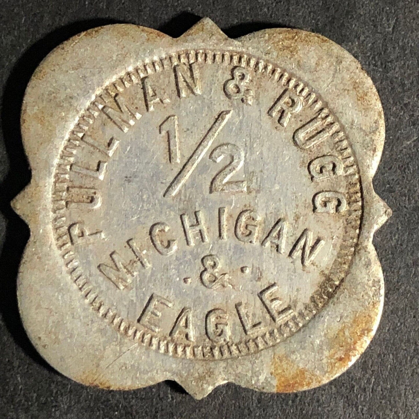 Pullman & Rugg (Buffalo, NY Garage?) 1/2 Scalloped Alum Token 27.6mm