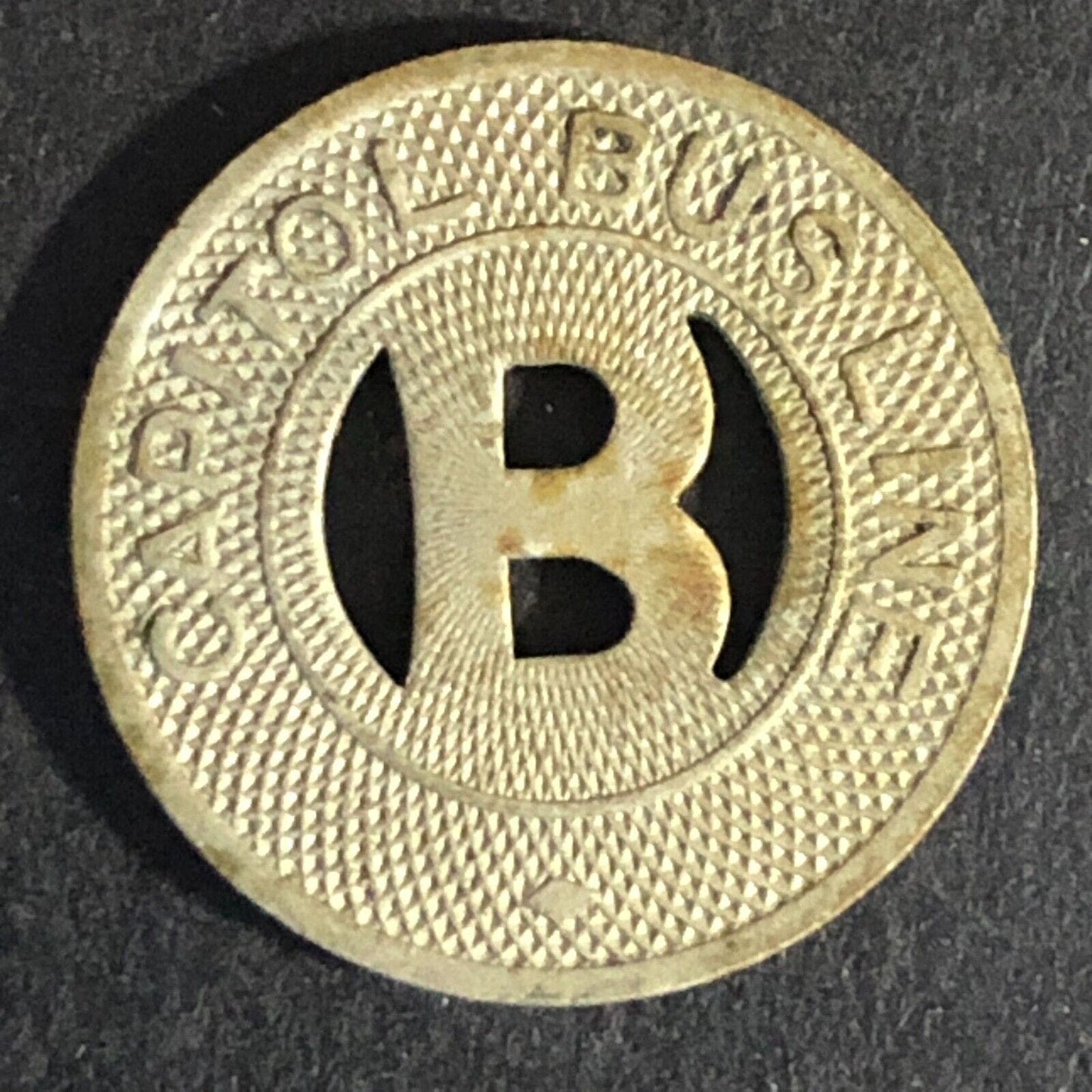 Capitol Bus Line (Bismarck, ND) WM G/F One Bus Fare Transit Token -- 20mm