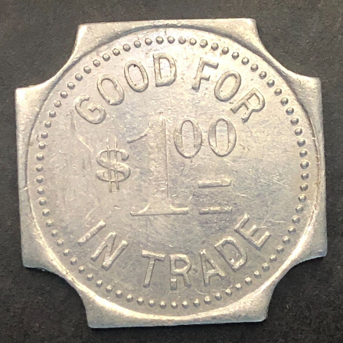 Delmont, SD "G.F. Buche Co." (Gen. Mdse.) G/F $1 Alum. Trade Token 25mm