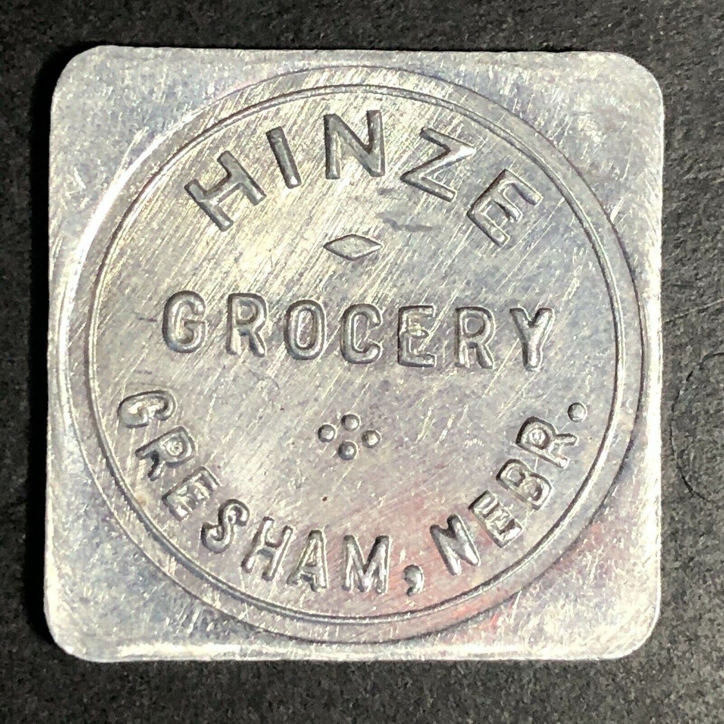 Hinze Grocery 28mm Aluminum Token "Good For 50c In Trade" Gresham, Nebraska